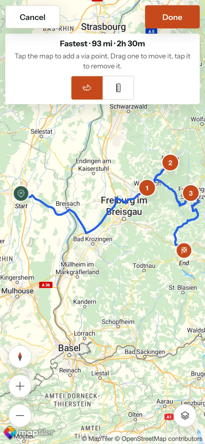 The full-screen route map with three numbered via points through the Black Forest, Cancel and Done at the top and the Fastest / Shortest switch.